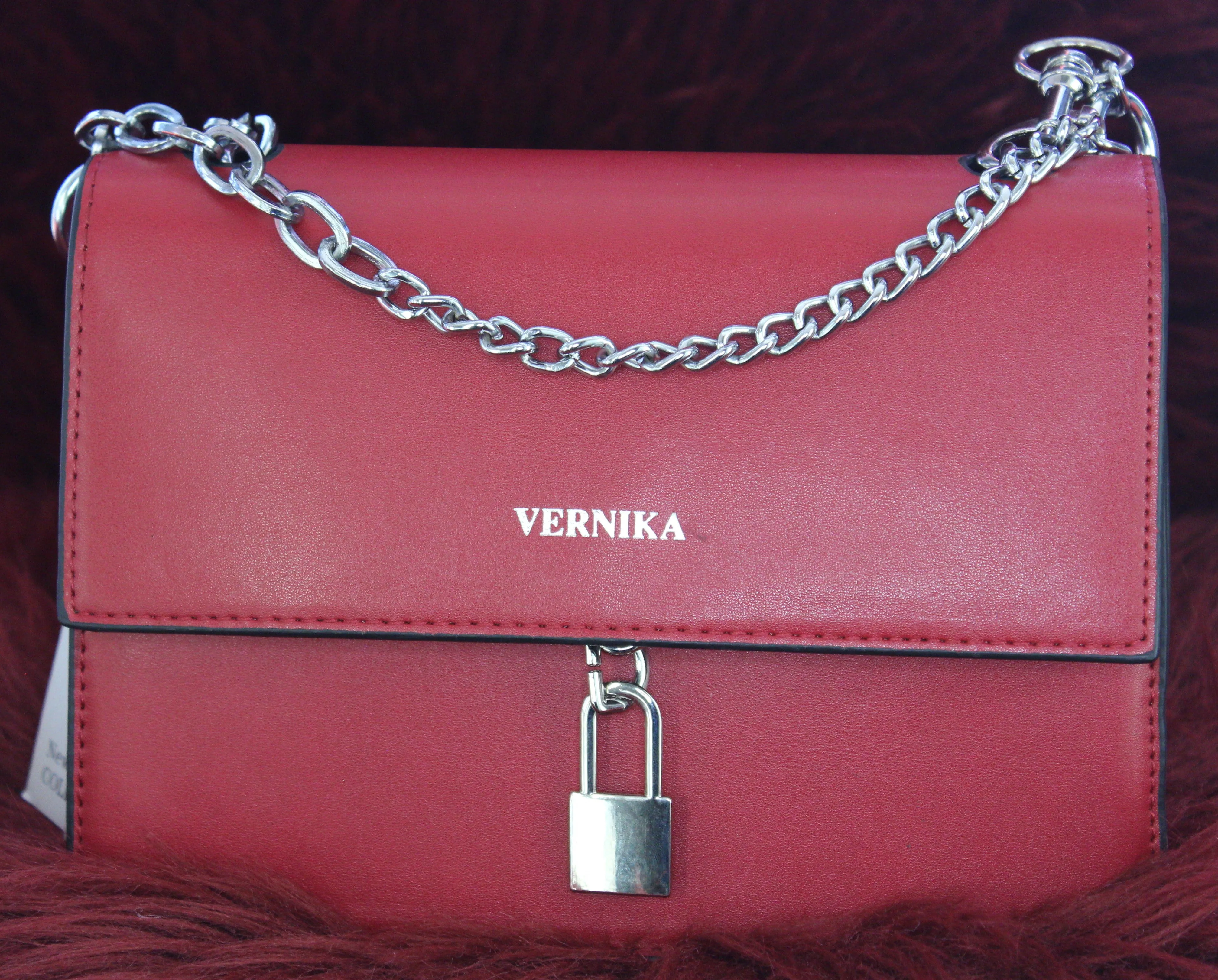 Leather crossbody bag with padlocks